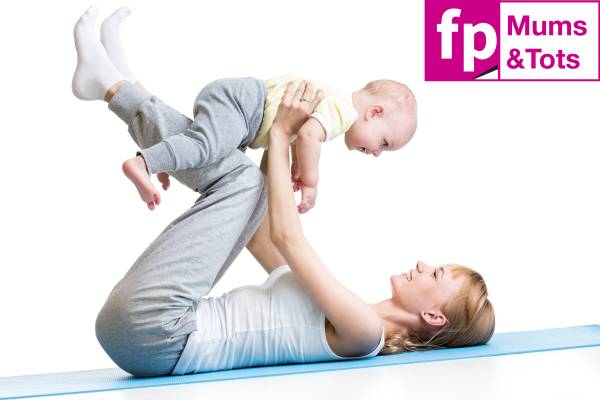 Mother And Baby Making Gymnastics